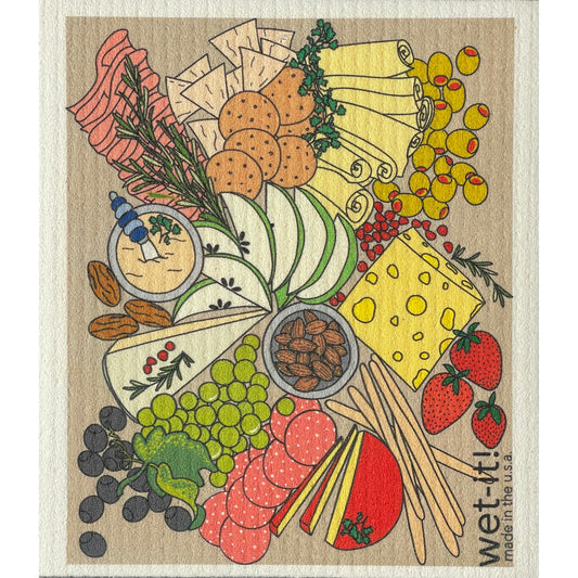 Charcuterie-themed Swedish dishcloth; beige background, colorful food illustrations, "wet-it!" logo.